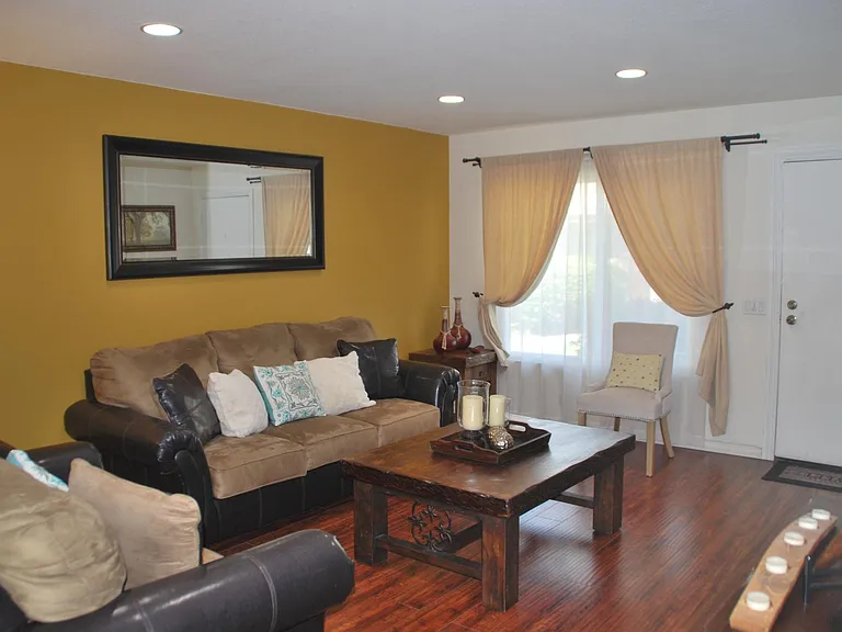 Living room (accent wall to be painted neutral)