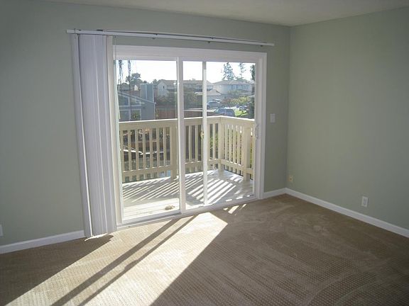 MBR with balcony and water view