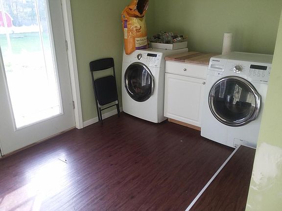 Communal laundry room and back patio exit, also leads to gar