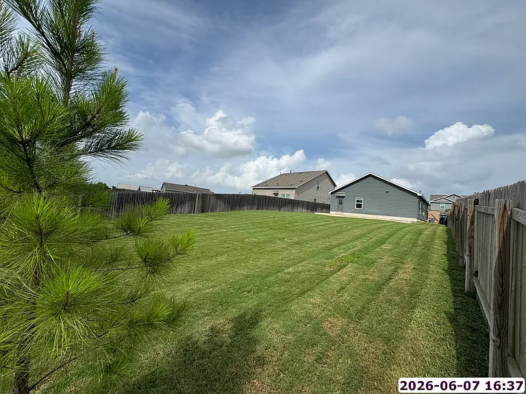 Backyard view of house