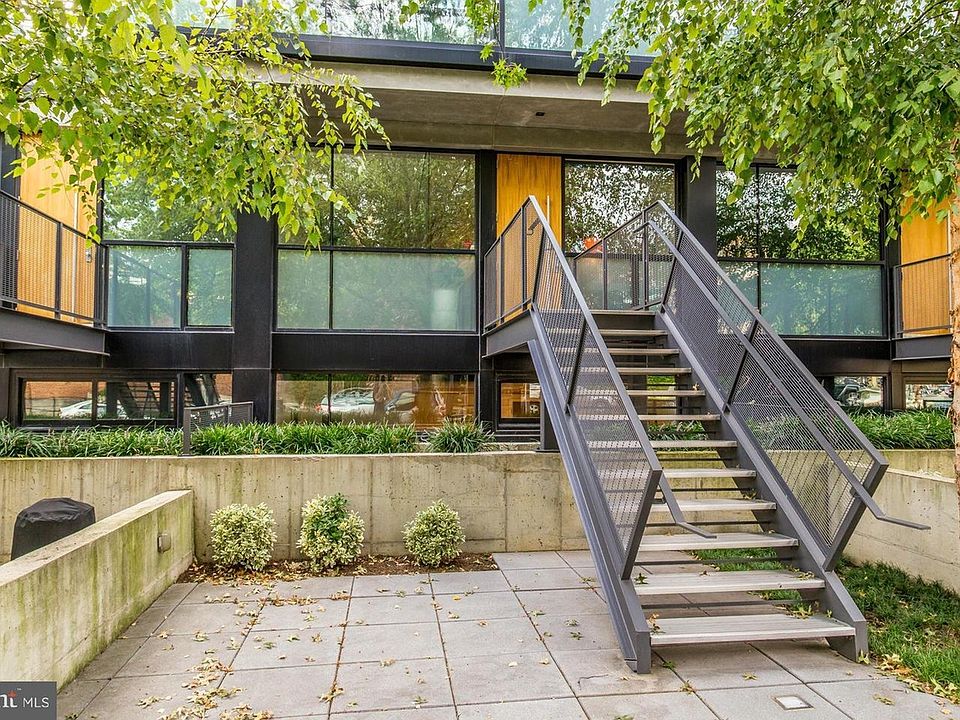 Private street-level entrance and a 400 sq. ft. walled-in patio facing 11th Street NW.