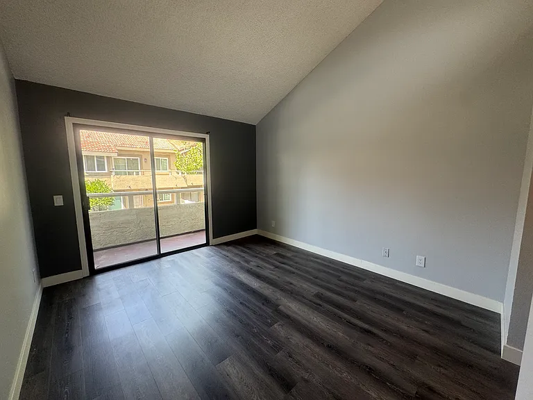 High ceiling and spacey Master Bedroom with patio