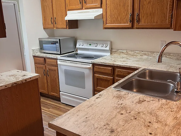 Kitchen with all appliances included.