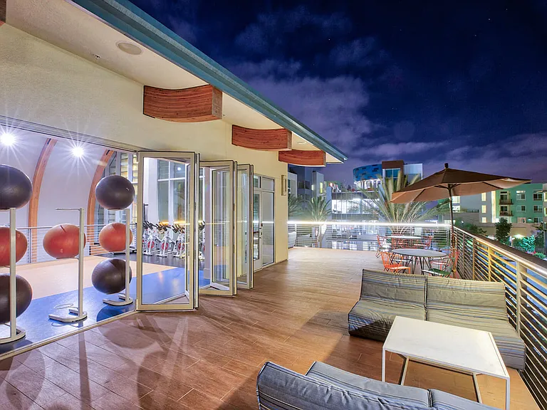 Stretch out on the yoga sun deck and enjoy the view of the community