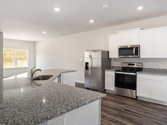 Chefs will love this upgraded kitchen with stainless steel appliances