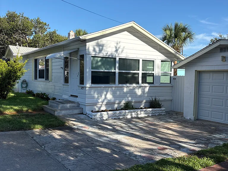 Florida room exterior and driveway
