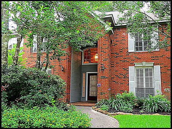 Lush landscaping front and back with new retaining wall.. This home has a recent roof. Carpet and wa