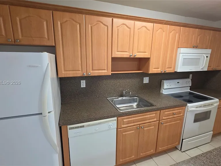 5839 SW 74th Ter #203 — Photo 6