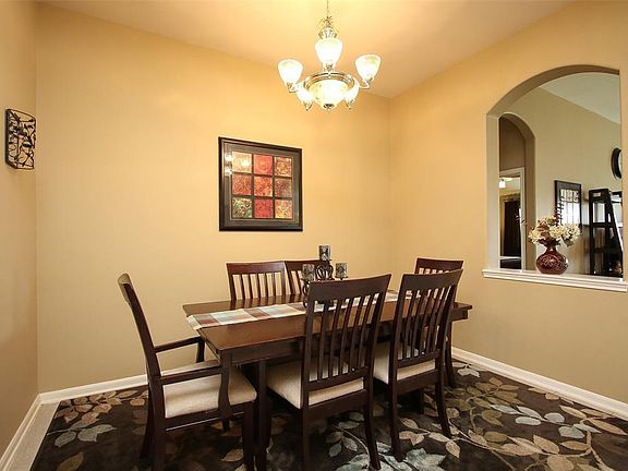 Formal dining that over looks into family room.