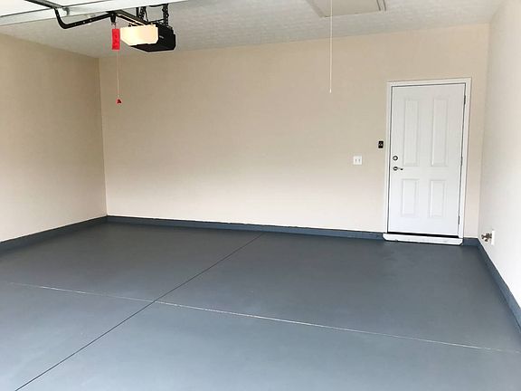 Newly painted 2 car XL attached garage with pull down stairs