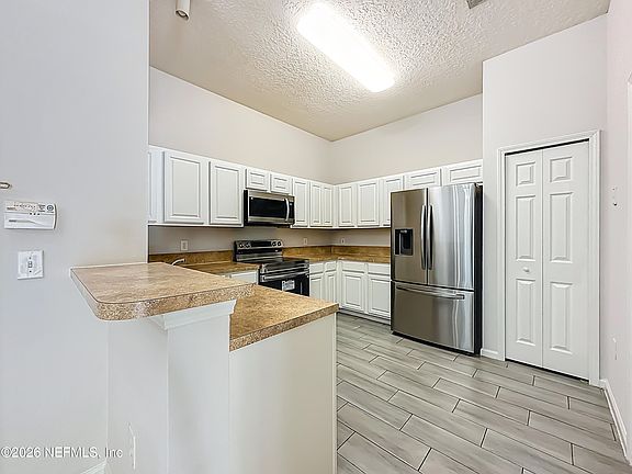 4th image of 7920 MERRILL Road #1107