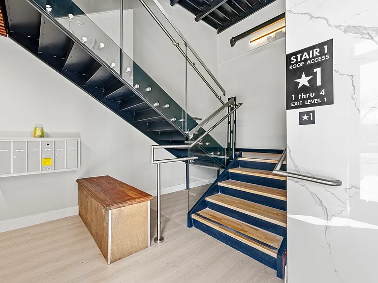 Convenient waiting area for guests or deliveries, alongside a secure mail pickup spot.