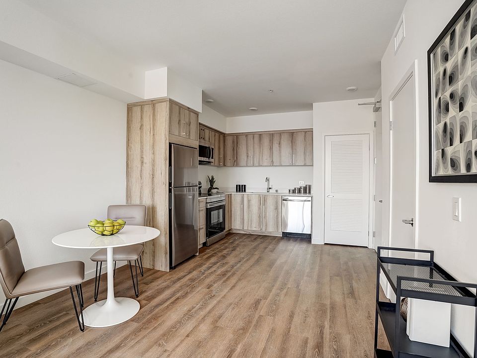 Open Kitchen and Dining Areas.