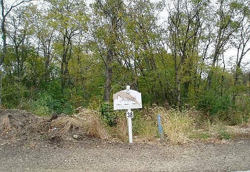 3/4 acre WOODED Walkout