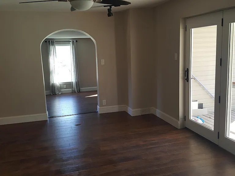 Dining/Living rm looking into family room and side covered deck