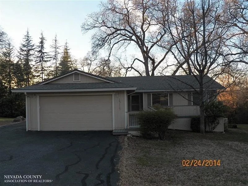 15115 Woodland Loop photo 1