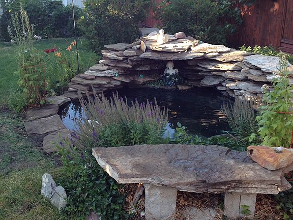 Pond, fountain & bench