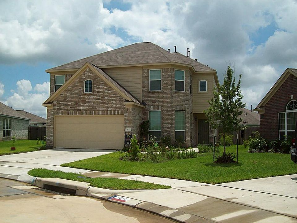 Front of house. See sidewalk going to the front door,