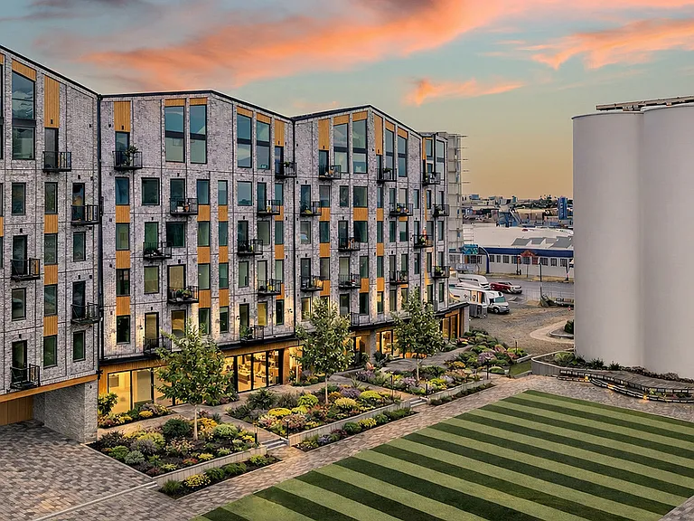 Silo Park at sunset, where modern living meets the character of Salt Lake City's Granary District.