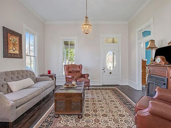 Open the door and instantly feel the warmth of this lovely home! Fresh paint throughout with tons of natural light makes this home move-in ready! And look at that marvelous chandelier all a glow to welcome you home!