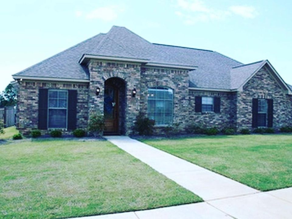 Front view of the home. There is a very large wide open, fenced in back yard.
