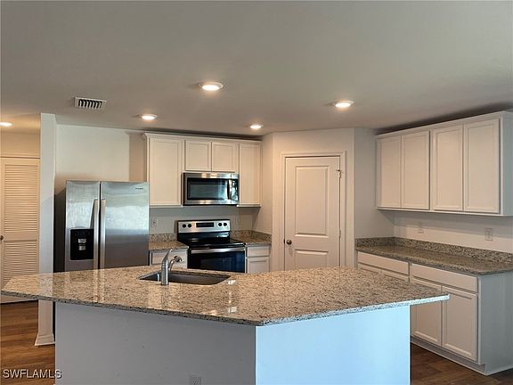 4th image of 2120 Santa Barbara Blvd N