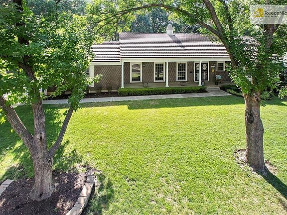 Excellent aerial view of the gorgeous home on a great tree-lined street with great access to highways and shopping.