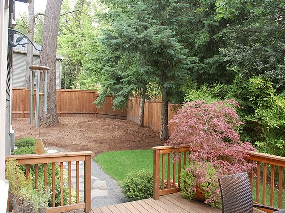 Beautiful, private lot, professionally  landscaped with 12'x20' deck.