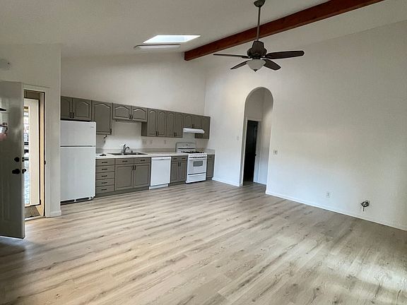 16 foot vaulted ceilings with a skylight for additional lighting