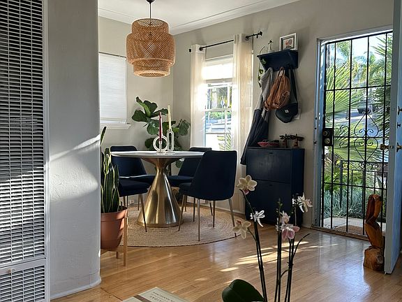 View of Dining Room and Front Door from Living Room.