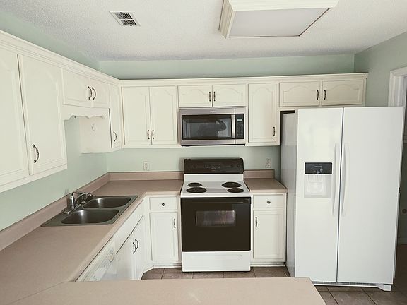 Kitchen area with lots of cabinet space