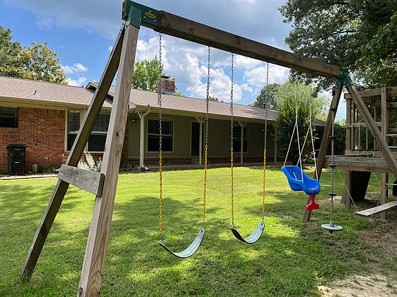 Build in swing set and tree house