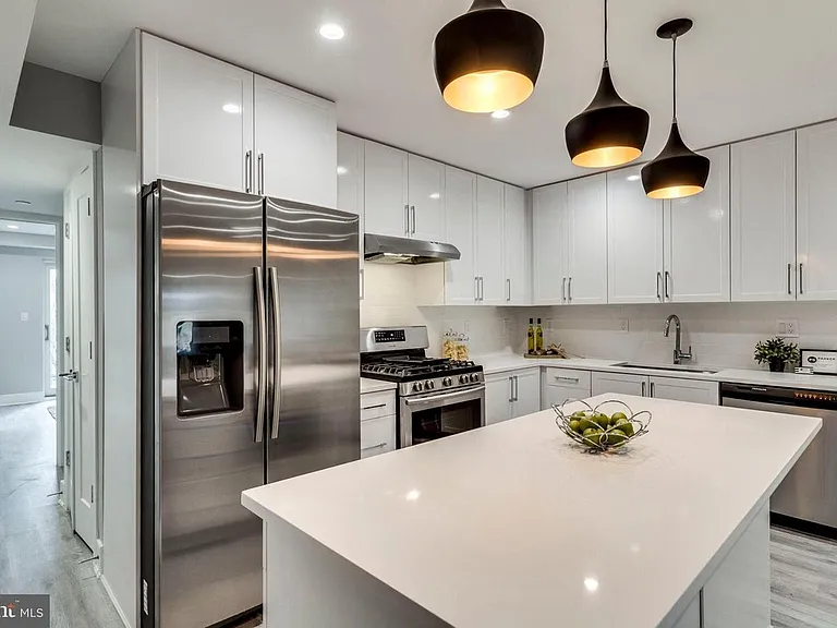 Modern kitchen with oversized island and upgraded fixtures