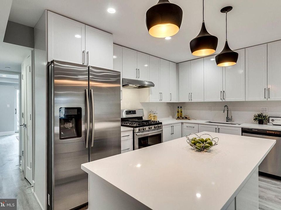 Modern kitchen with oversized island and upgraded fixtures