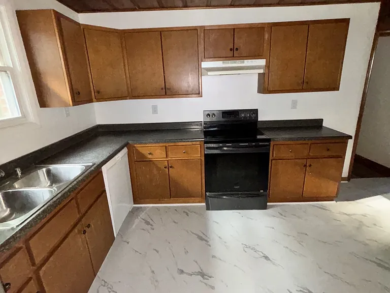 Kitchen, with natural lighting, and all kitchen appliances included.