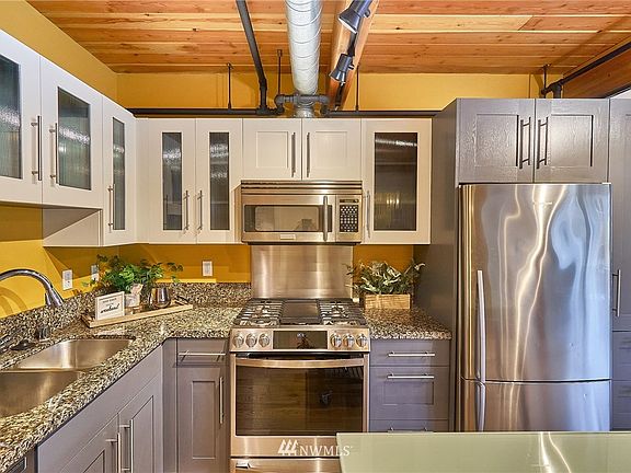 Set the mood or enjoy enhanced lighting for your holiday meal prep with custom Under Cabinet Lights. Kitchen cabinets and some walls & trim repainted in 2020. Most of the rest of the paint is new in 2021! Of course, with  a walk score of 99 and 25+ LOCAL eateries within two block radius, you can walk your party out and support local!