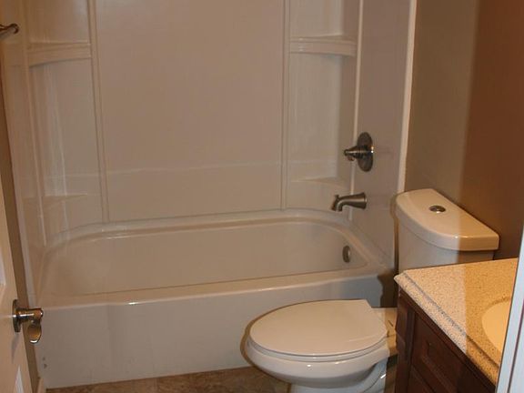 Bathroom new tub/toilet/tile