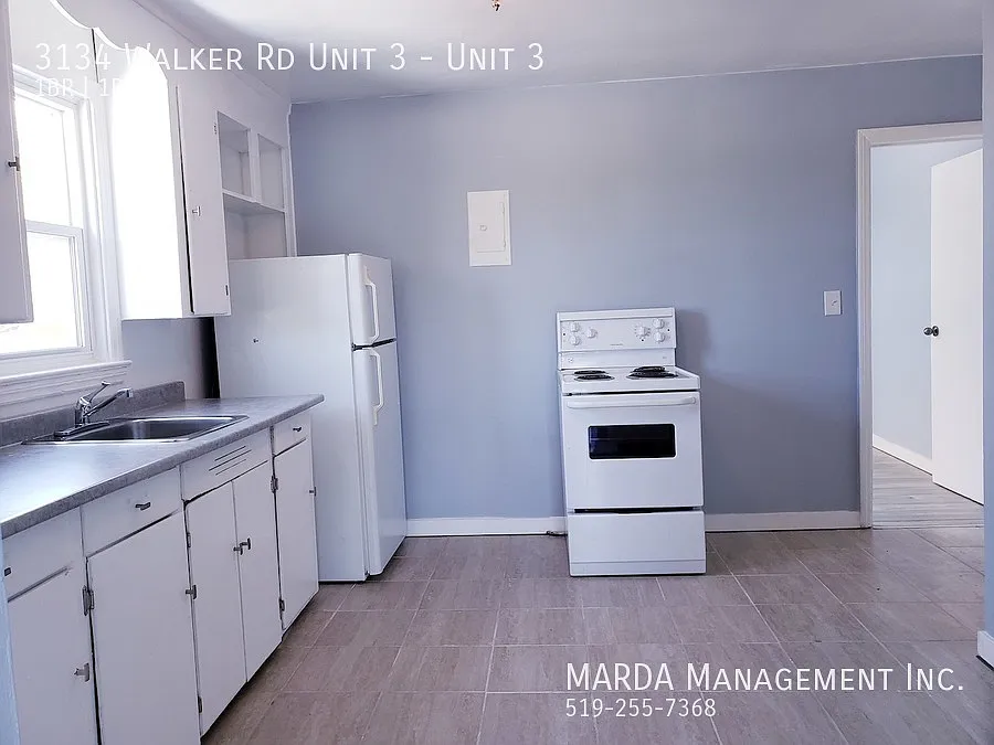 Spacious 1 Bed/1 Bath Unit On Walker! + Hydro — Photo 2