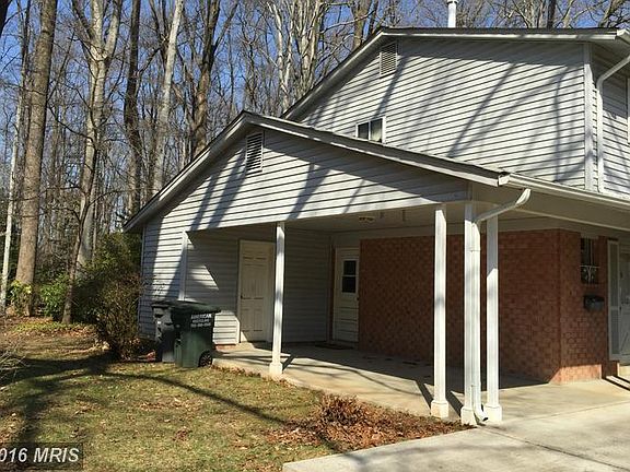 1-car carport with access to kitchen and shed