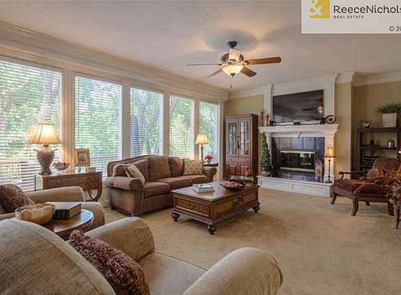 Open floor plan with a wall of windows.