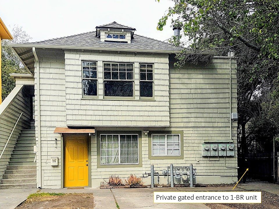 Triplex - private gated entrance to the 1BR unit on the right side