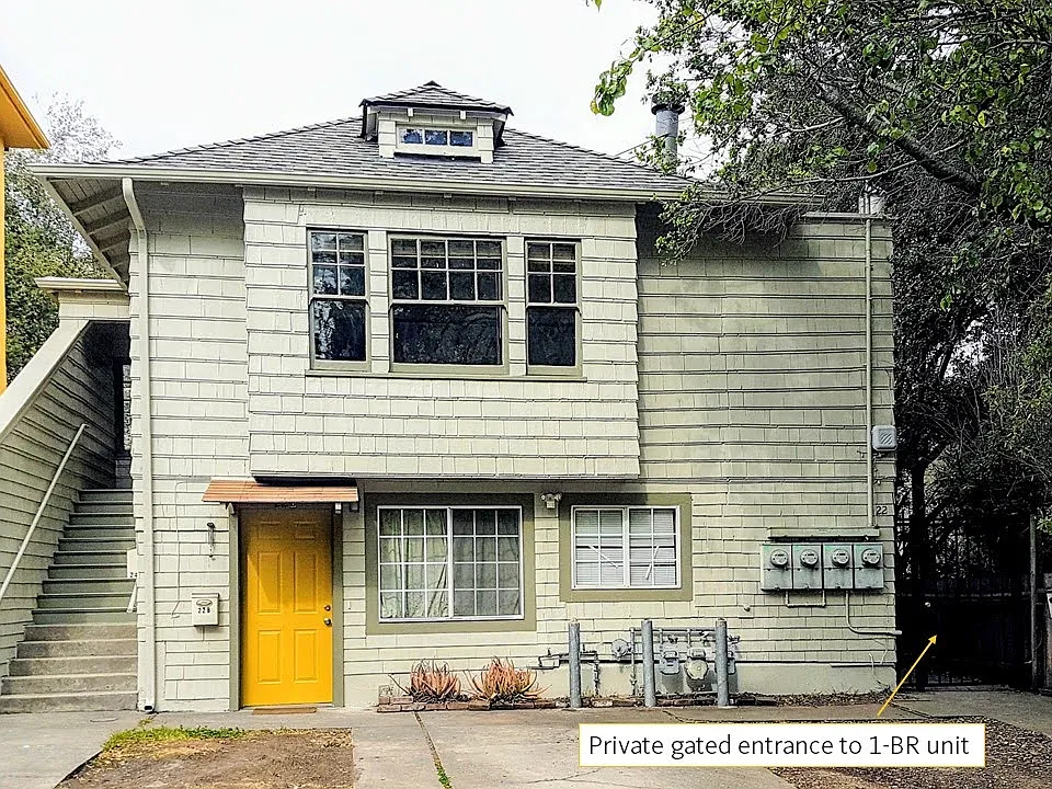 Triplex - private gated entrance to the 1BR unit on the right side