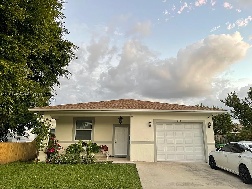 210 SW 4th St