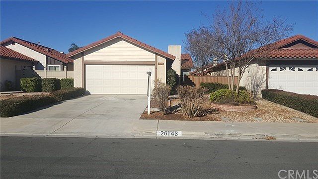The front of this 55+ community Patio home at 26146 Shadywood Street