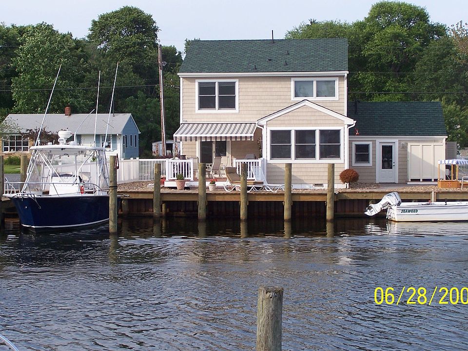 62' Water frontage w/ private slip, new B/H, Dock