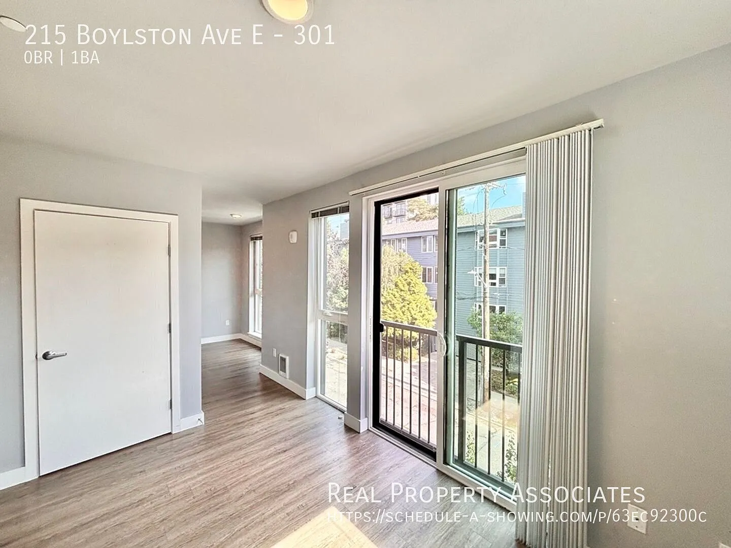 Bright & Updated Capitol Hill Studio with Juliet Balcony & In-Unit Laundry — Photo 4