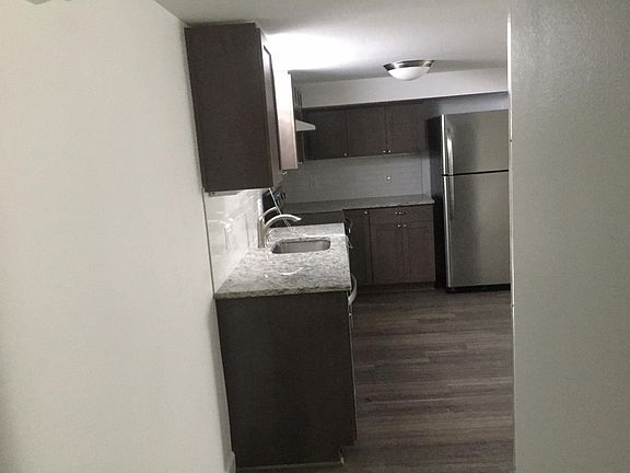 ADU Unti "B" entrance to kitchen . Custom/Granite/Stainless