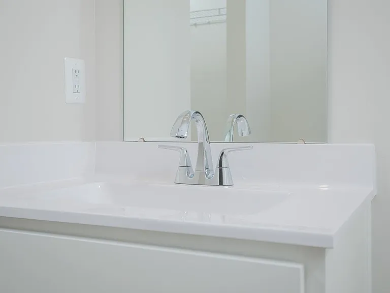 Cultured marble sink with Kohler faucet