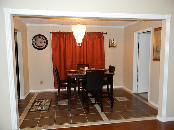 BREAKFAST AREA W UPDATED CERAMIC TILE.