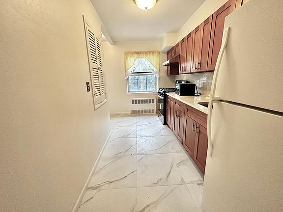 2nd image of 6162 71st St Floor 2